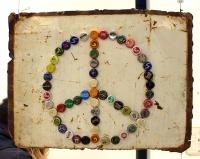 _the emblem of peace in magnets and bottlecaps smljpg.jpg